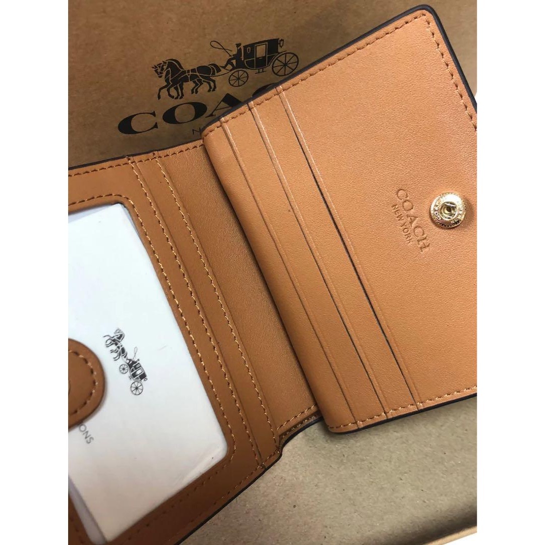 COACH - 配送料込✨匿名 配送 新品 COACH 二つ折り財布 白 コンパクト