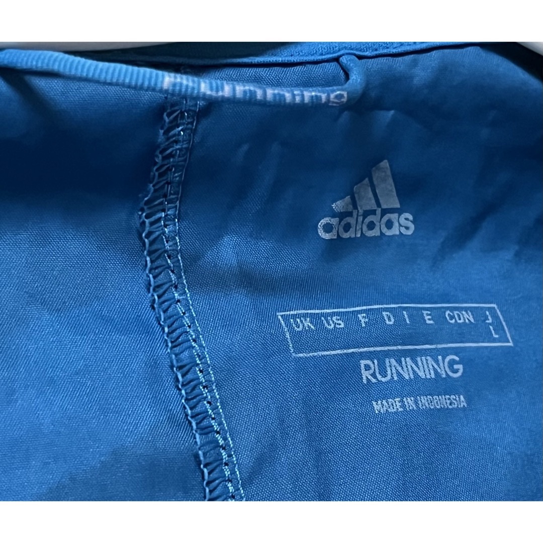 adidas(アディダス)の【送料込】アディダス   ウィンドブレーカー  Lサイズ スポーツ/アウトドアのランニング(ウェア)の商品写真