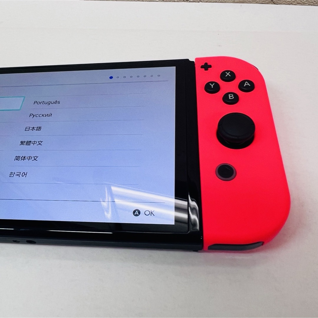 Nintendo Switch(ニンテンドースイッチ)の美品 Switch有機EL ネオンカラー　中古 エンタメ/ホビーのゲームソフト/ゲーム機本体(家庭用ゲーム機本体)の商品写真