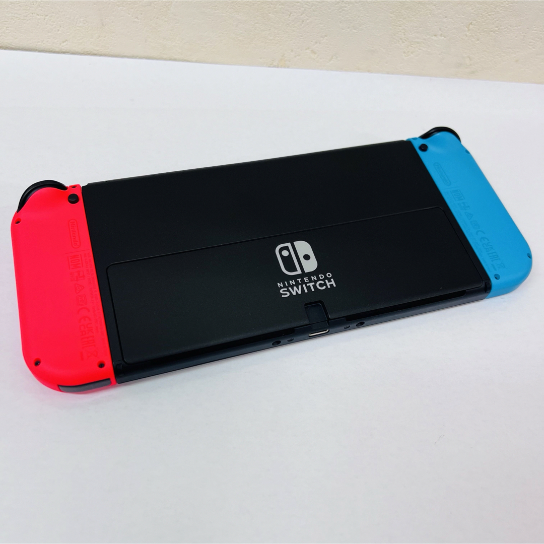 Nintendo Switch(ニンテンドースイッチ)の美品 Switch有機EL ネオンカラー　中古 エンタメ/ホビーのゲームソフト/ゲーム機本体(家庭用ゲーム機本体)の商品写真