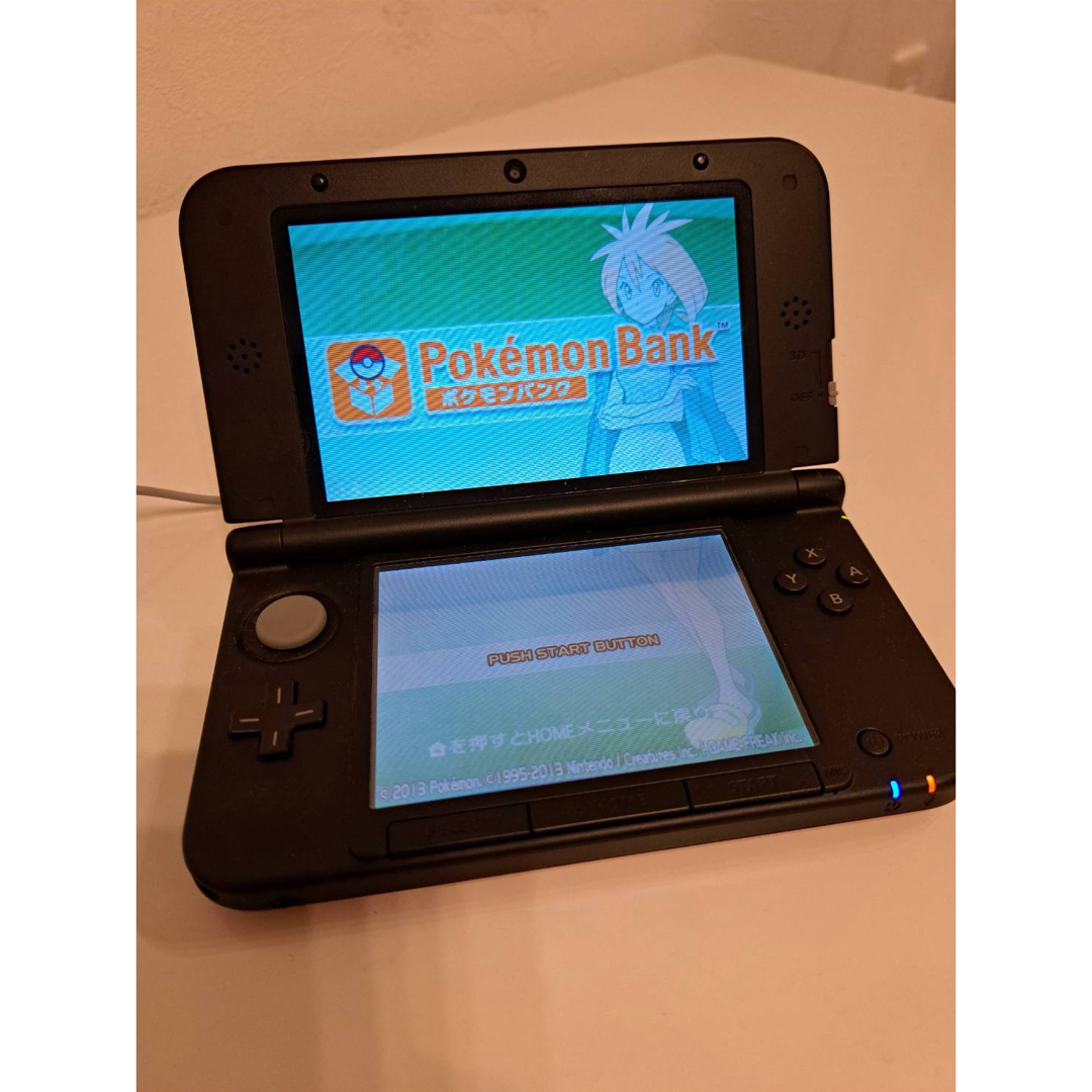 ニンテンドー3DS(ニンテンドー3DS)のニンテンドー3DS LL レッドXブラック（ポケモンバンク） エンタメ/ホビーのゲームソフト/ゲーム機本体(携帯用ゲーム機本体)の商品写真