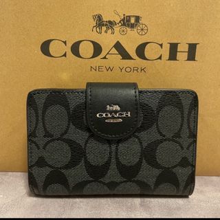 コーチ(COACH)の新品　COACH 長財布　二つ折り財布　ブラック ワンポイント　小銭入れ有(財布)