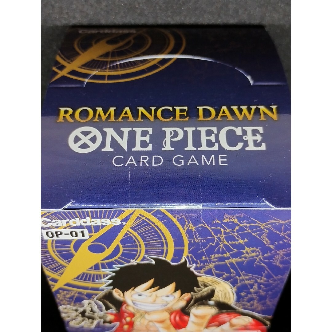 ONE PIECE(ワンピース)のワンピースカードゲーム　ROMANCE DAWN　未開封BOX　テープ付き エンタメ/ホビーのトレーディングカード(Box/デッキ/パック)の商品写真