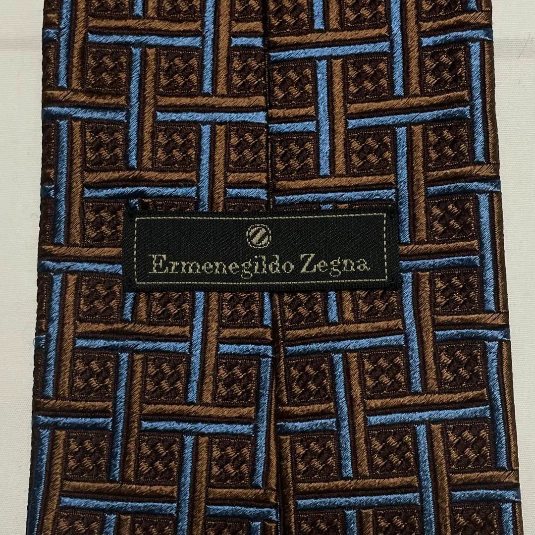 Ermenegildo Zegna(エルメネジルドゼニア)の最高級 エルメネジルドゼニア 幾何学チェック柄 ブラウン 総シルク 伊製 美品 メンズのファッション小物(ネクタイ)の商品写真