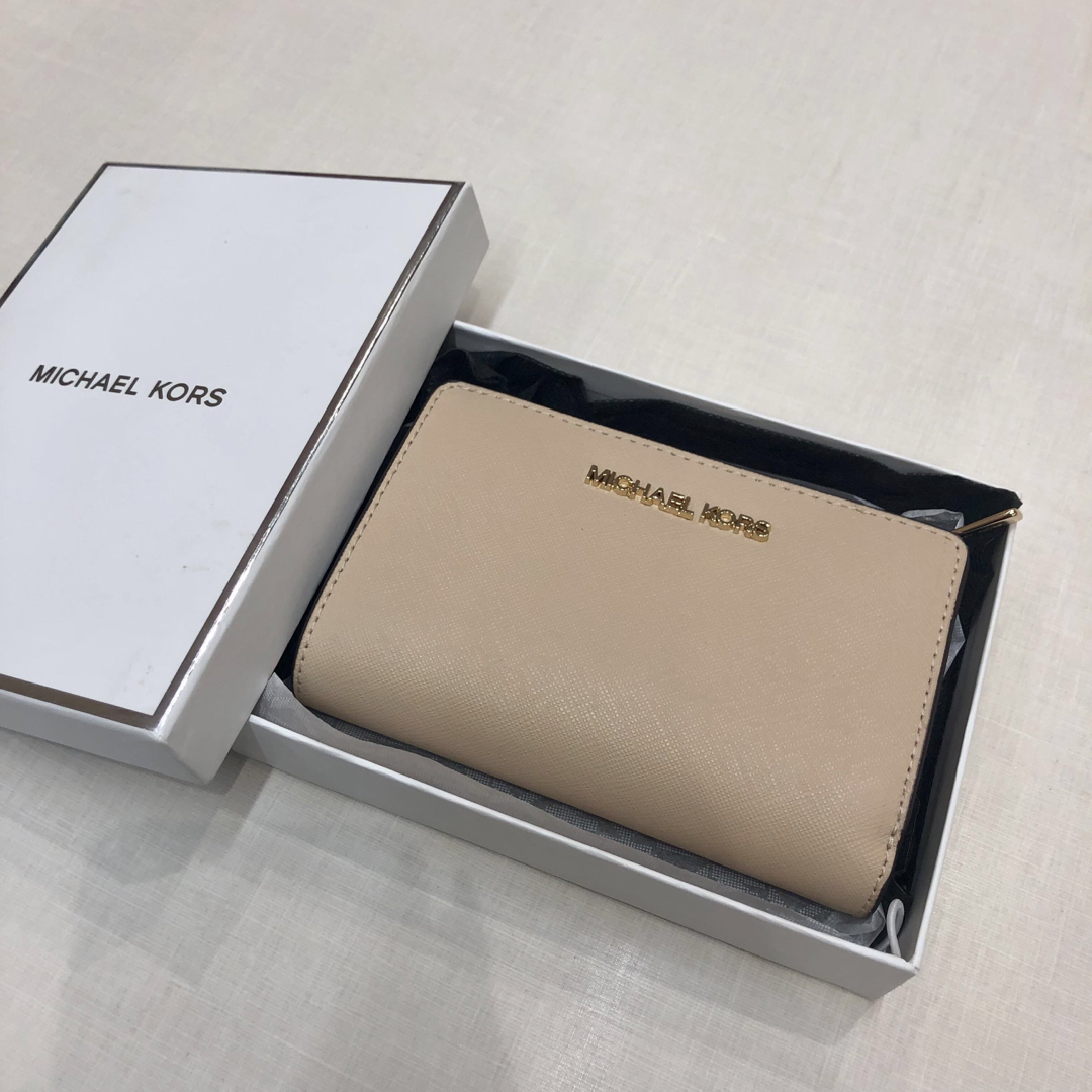 Michael Kors(マイケルコース)の◇マイケルコース　二つ折り財布　ライトブラウン　未使用◇ レディースのファッション小物(財布)の商品写真