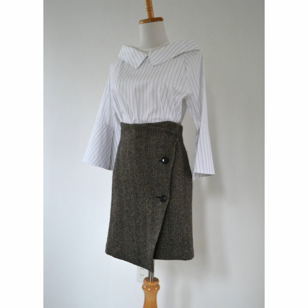 ORIZZONTI(オリゾンティー)のオリゾンティ　台形スカート　巻きスカート　ツイード レディースのスカート(ひざ丈スカート)の商品写真