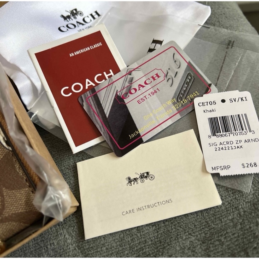 COACH(コーチ)の未使用新品 COACHスヌーピー( ･ ´｀(●)コラボ長財布 レディースのファッション小物(財布)の商品写真