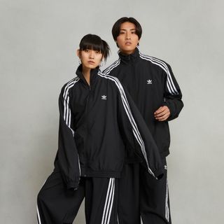 IV9339adidas ADILENIUM オーバーサイズ トラックトップ セットアップ②