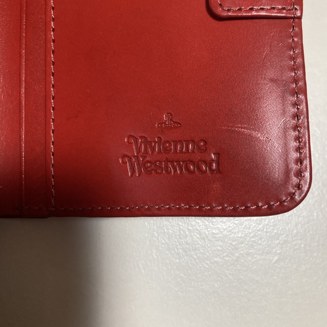 Vivienne Westwood(ヴィヴィアンウエストウッド)の値下げ　ヴィヴィアンウエストウッド　2つ折り財布　レザー　赤 レディースのファッション小物(財布)の商品写真