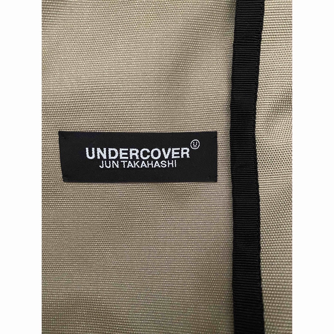 UNDERCOVER(アンダーカバー)の新春再々値下げundercover x EASTPAK コート 未使用 サイズ2 メンズのジャケット/アウター(ステンカラーコート)の商品写真
