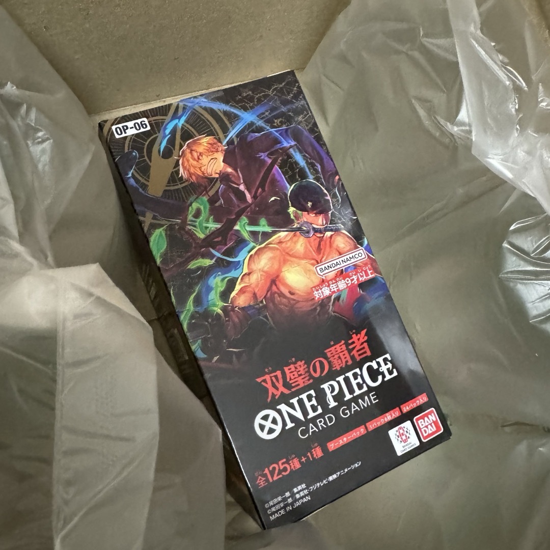 ONE PIECE(ワンピース)のONE PIECEカード 双璧の覇者 OP-06 テープ付き 1box エンタメ/ホビーのトレーディングカード(Box/デッキ/パック)の商品写真