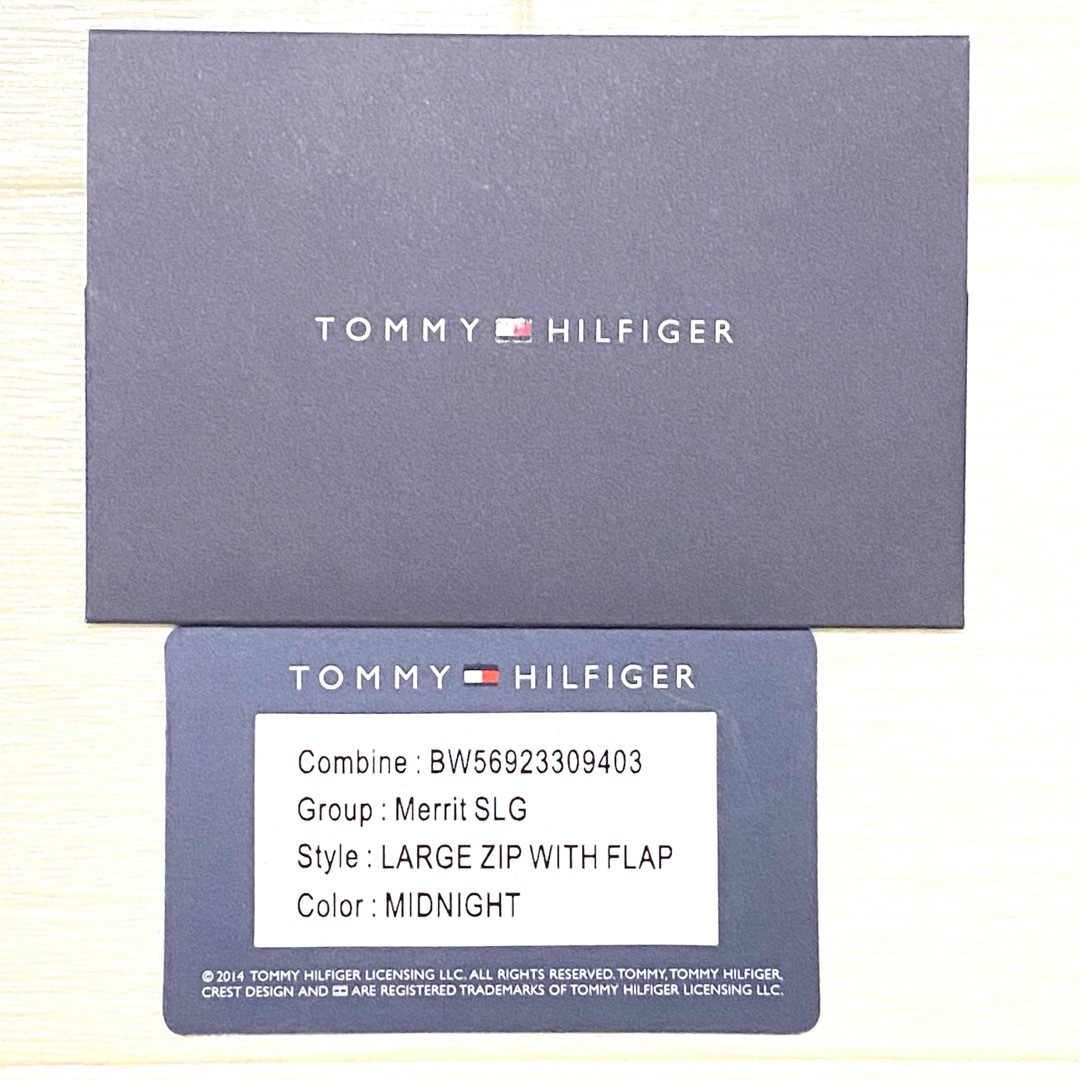 TOMMY HILFIGER(トミーヒルフィガー)の新品未使用　トミーヒルフィガー　二つ折り財布　ネイビー　ロゴ レディースのファッション小物(財布)の商品写真