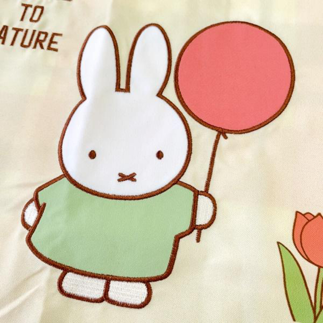 miffy(ミッフィー)のミッフィー　エプロン　保育士エプロン　チューリップ エンタメ/ホビーのおもちゃ/ぬいぐるみ(キャラクターグッズ)の商品写真