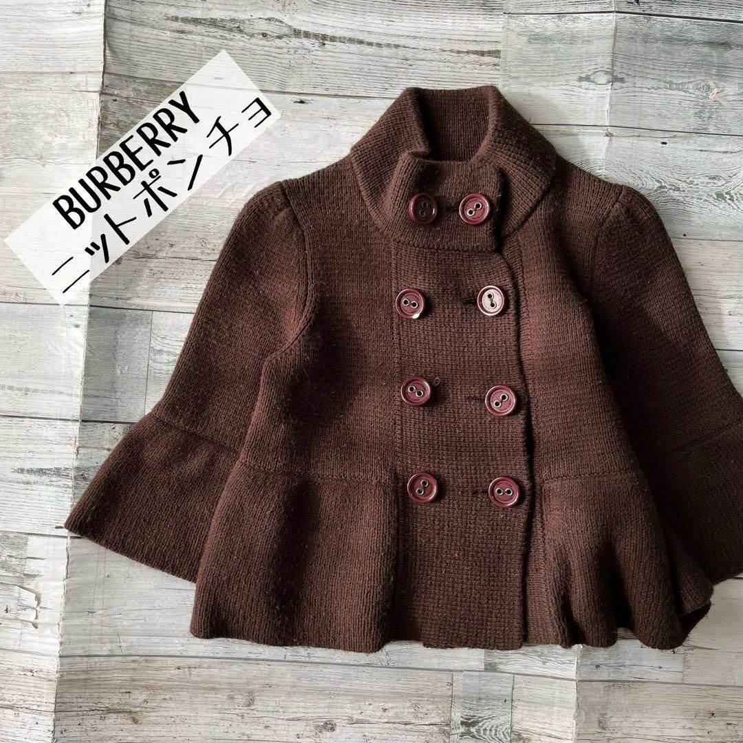 BURBERRY BLUE LABEL(バーバリーブルーレーベル)のバーバリーBURBERRYニットポンチョブラウンロゴ入り古着 レディースのジャケット/アウター(ポンチョ)の商品写真