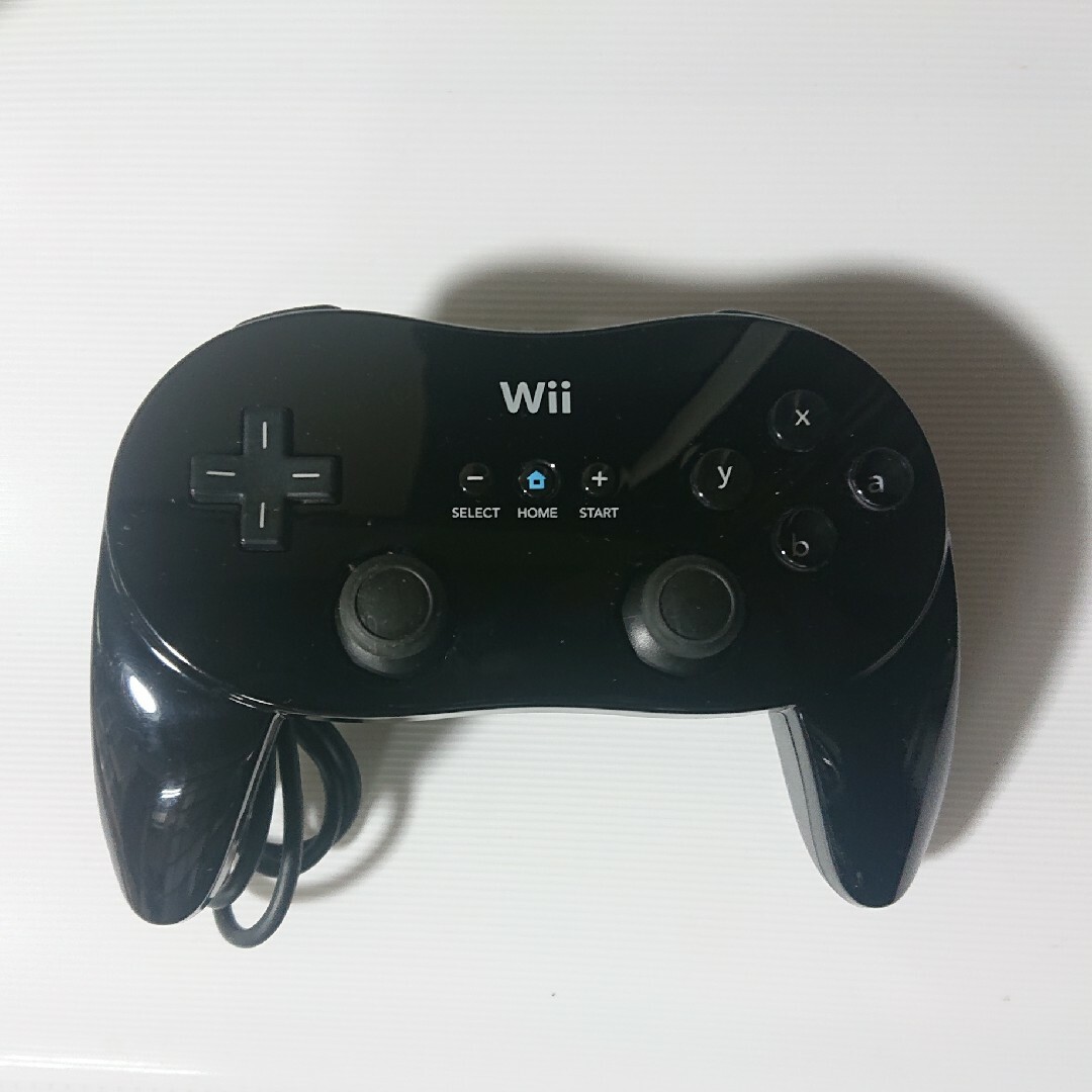 Wii(ウィー)のWii/WiiU クラシックコントローラーPRO 黒 ブラック ニンテンドー純正 エンタメ/ホビーのゲームソフト/ゲーム機本体(家庭用ゲーム機本体)の商品写真