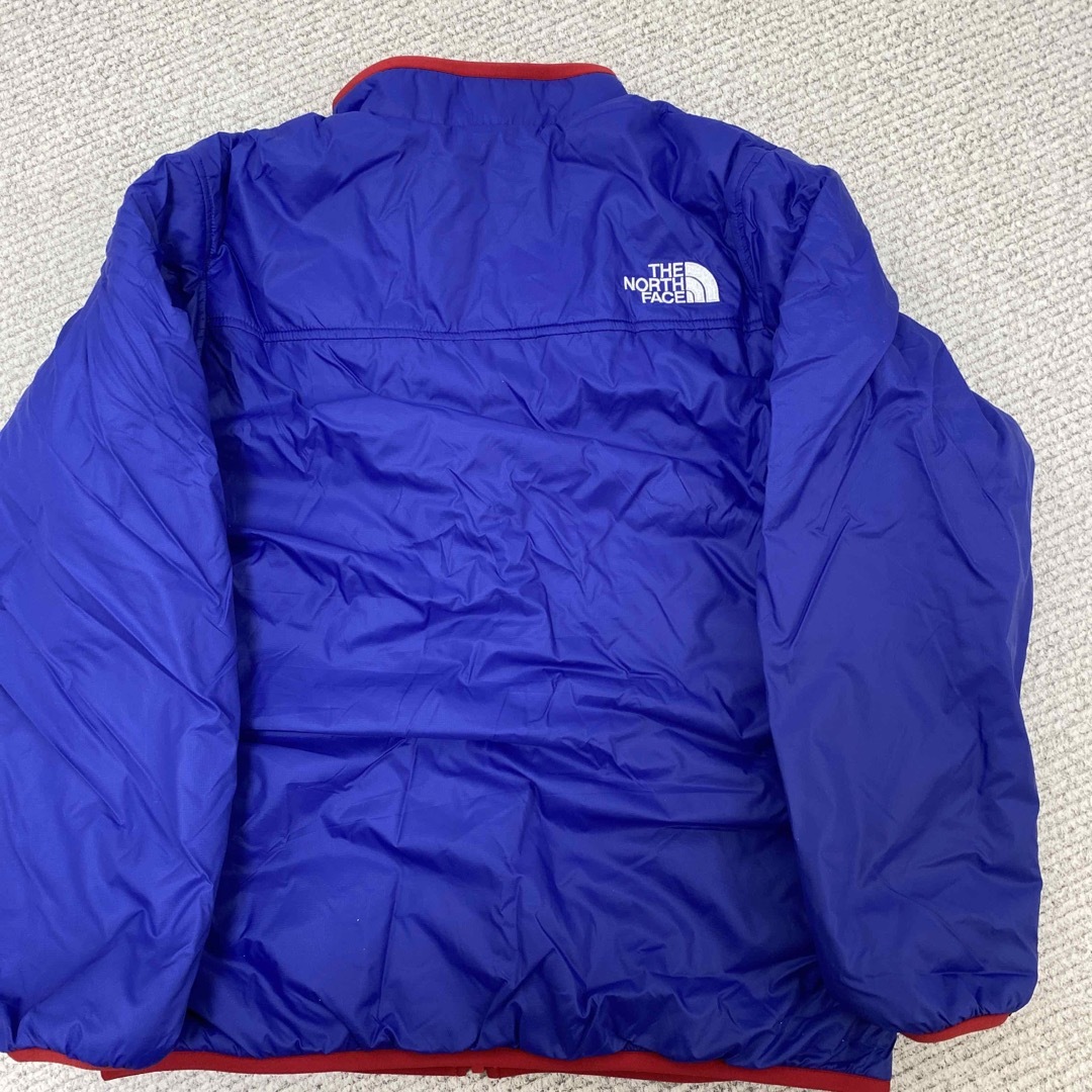 THE NORTH FACE(ザノースフェイス)の新品未使用150cm  リバーシブルコージージャケット キッズ/ベビー/マタニティのキッズ服男の子用(90cm~)(ジャケット/上着)の商品写真