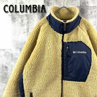 コロンビア(Columbia)の定番人気 コロンビア ボアフリースジャケット 刺繍ロゴ ベージュ×ネイビー L(ブルゾン)