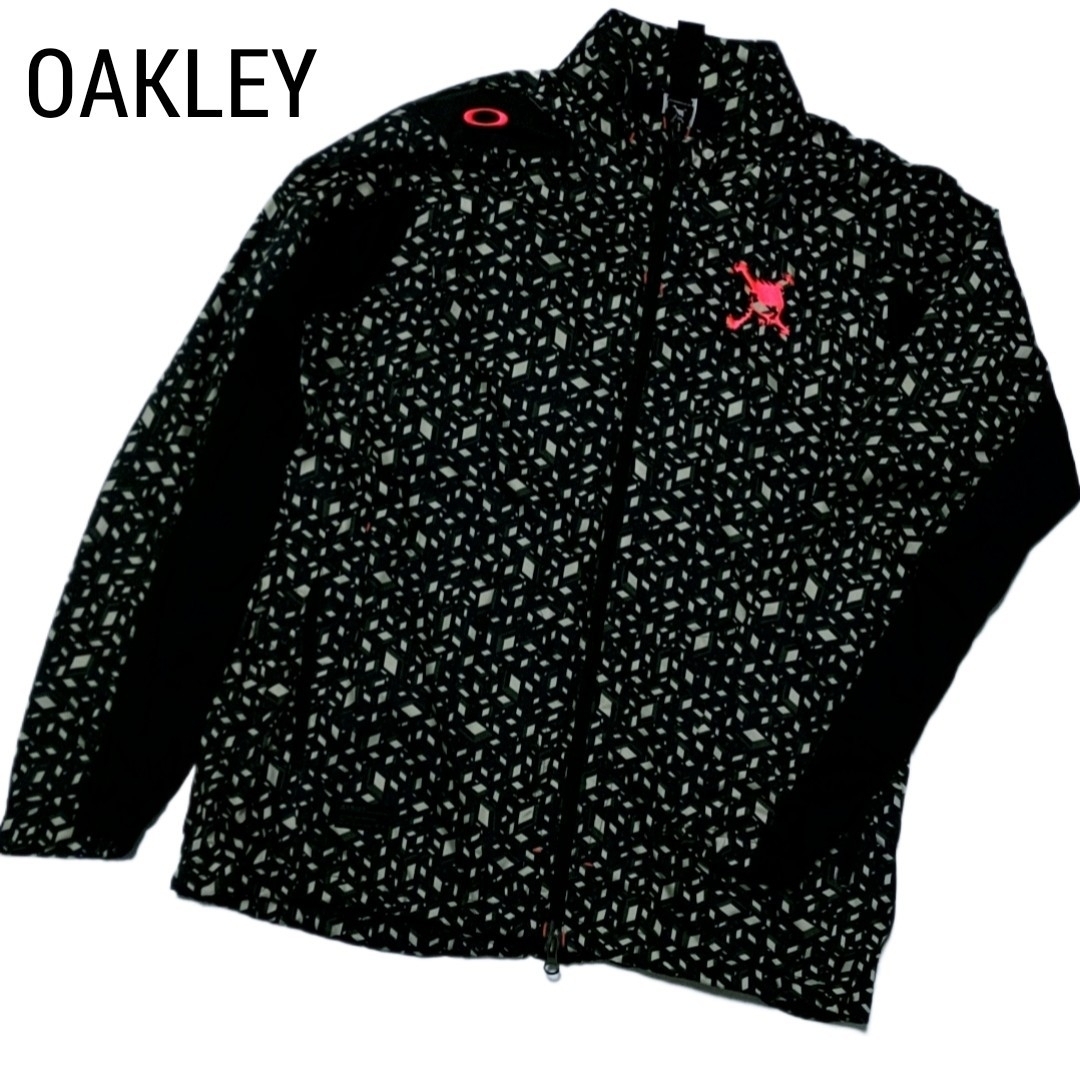 Oakley(オークリー)のOAKLEY オークリー スカル メンズ ジャケット アウター XL 黒 総柄 スポーツ/アウトドアのゴルフ(ウエア)の商品写真