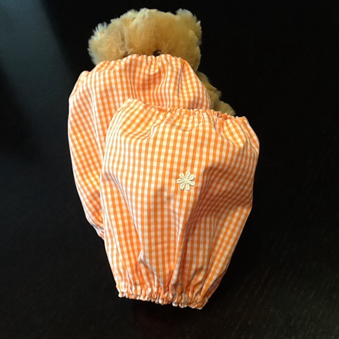 コンパクトサイズ　ハンドメイドアームカバー　ギンガムチェックオレンジ　コットン ハンドメイドの生活雑貨(キッチン小物)の商品写真