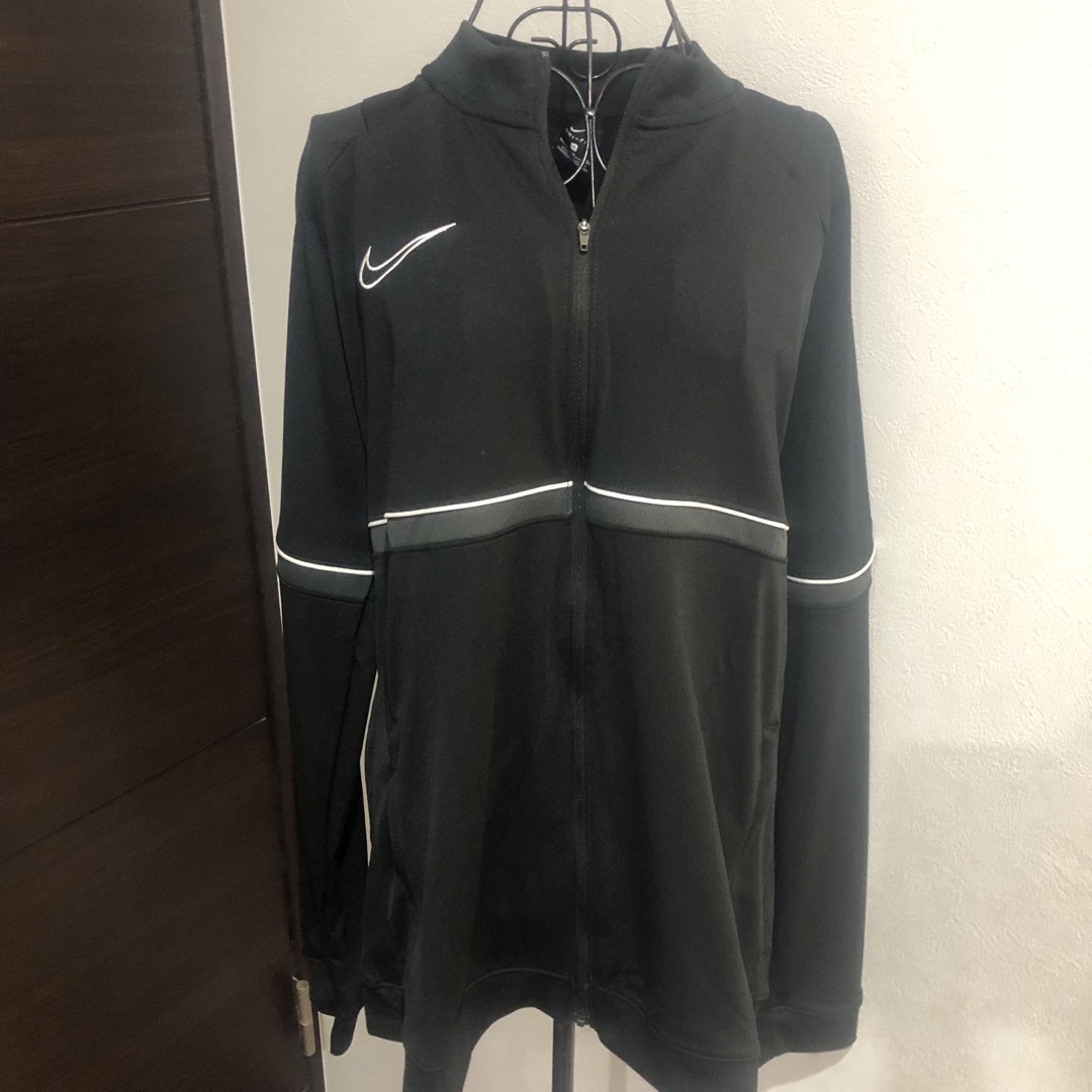 NIKE(ナイキ)の新品未使用タグ付き　NIKE ナイキ　ジャージ　ウインドブレーカー レディースのジャケット/アウター(その他)の商品写真