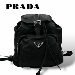 プラダ(PRADA)の美品 PRADA リュックサック 巾着 フラップ A4可 ナイロン レザー 黒(リュック/バックパック)