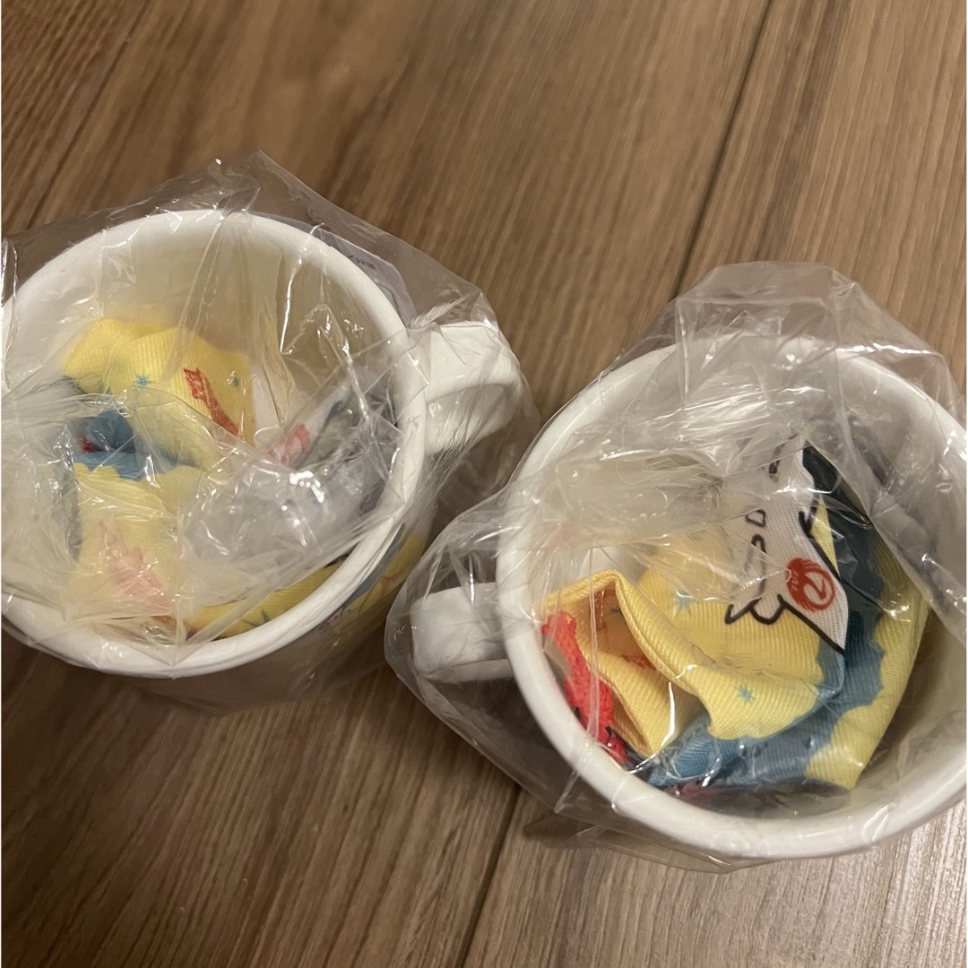JAL(日本航空)(ジャル(ニホンコウクウ))のJAL コップと巾着（黄色） キッズ/ベビー/マタニティの授乳/お食事用品(マグカップ)の商品写真