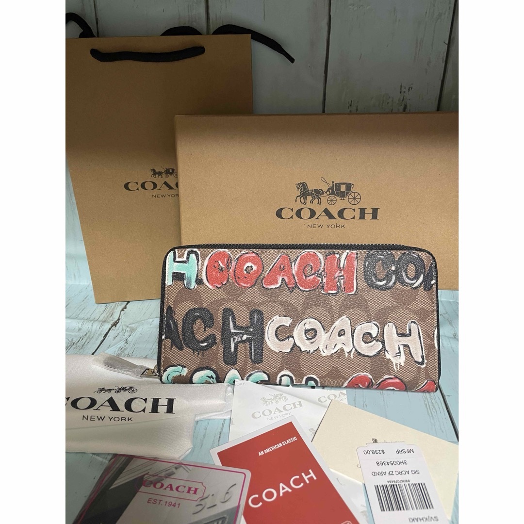 COACH(コーチ)のCOACH長財布ミント＆サーフコラボ　シグネチャー　ブラウン メンズのファッション小物(長財布)の商品写真