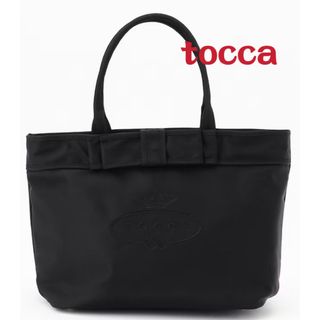 トッカ(TOCCA)のtocca トッカBOW RIBBON LOGONYLON M トートバッグ M(トートバッグ)