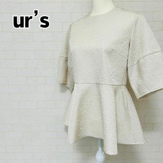 ユアーズ(ur's)の【美品】ur’s ユアーズ ふくれジャガードペプラムトップス オフホワイト M(カットソー(半袖/袖なし))