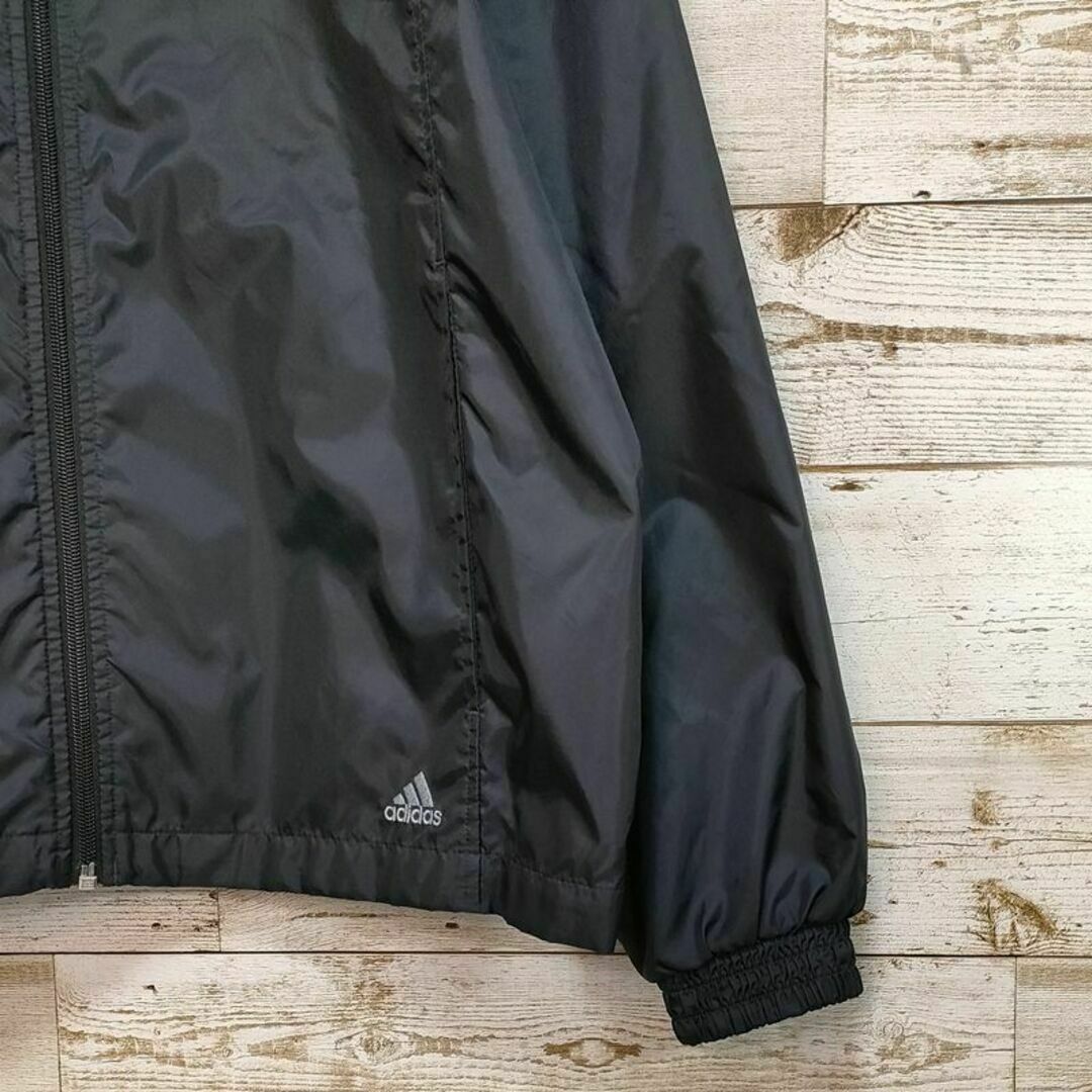 adidas(アディダス)の【086】US古着アディダストラックジャケットナイロンブルゾンテック前後刺繍ロゴ メンズのジャケット/アウター(ナイロンジャケット)の商品写真