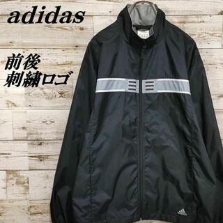 アディダス(adidas)の【086】US古着アディダストラックジャケットナイロンブルゾンテック前後刺繍ロゴ(ナイロンジャケット)