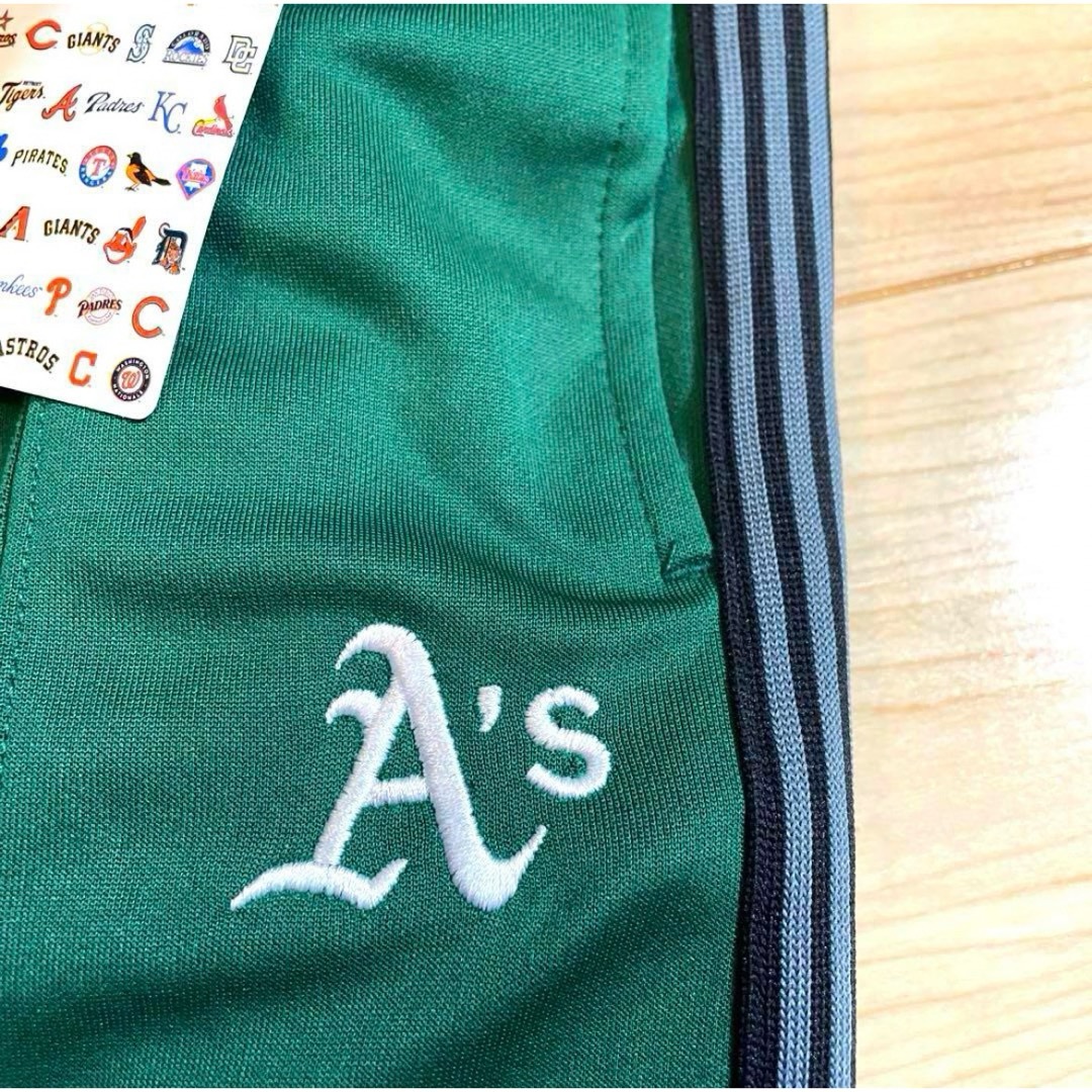 MLB(メジャーリーグベースボール)の新品　アスレチックス　ジャージ下　長ズボン　パンツ　サイドライン　130 キッズ/ベビー/マタニティのキッズ服男の子用(90cm~)(パンツ/スパッツ)の商品写真