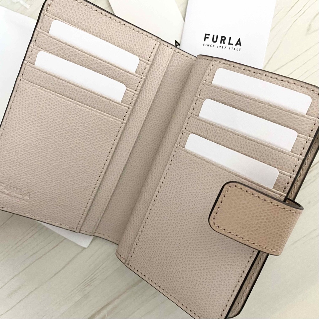 Furla(フルラ)のFURLA    折り財布   ピンクベージュ  二つ折り財布 レディースのファッション小物(財布)の商品写真