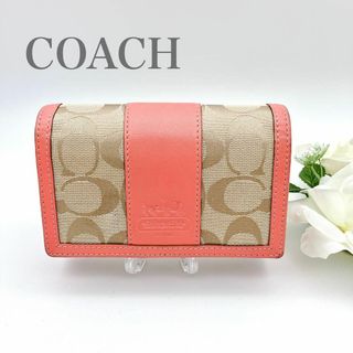 コーチ(COACH)のCOACH コーチ 二つ折り財布 シグネチャー L型ファスナー サーモンピンク(財布)