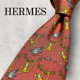 エルメス(Hermes)の美品 HERMES エルメス 猿 ワニ アニマル柄 ネクタイ レンガ色 朱色(ネクタイ)