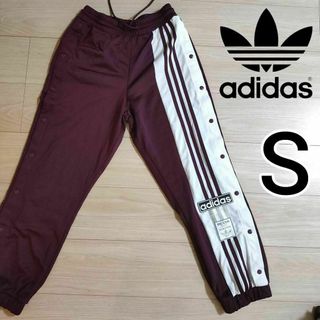 オリジナルス(Originals（adidas）)のアディダス 赤紫 アディブレイク スナップパンツ 女性S スウェット ジャージ(その他)