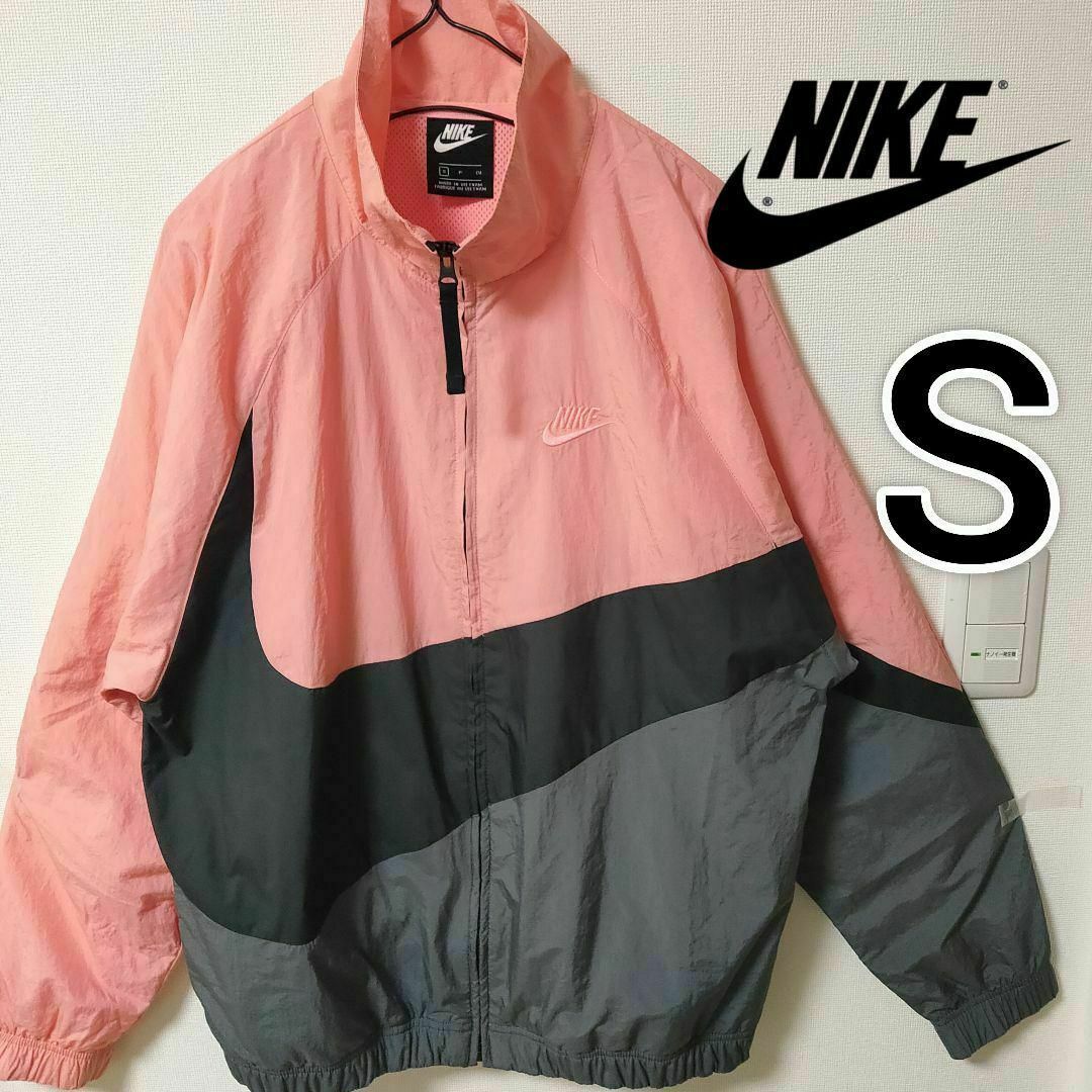NIKE - ナイキ ピンク ビッグスウッシュ ウーブン フーディ NIKE - ナイキ ピンク ビッグスウッシュ ウーブン フーディ