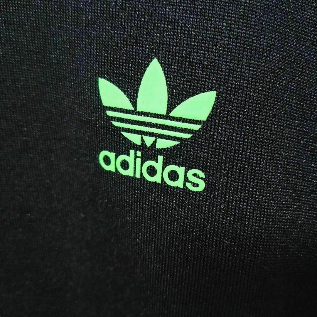 Originals（adidas）(オリジナルス)のアディダス 黒×緑 スワロフスキー SST ジャージ トラックトップ メンズO メンズのトップス(ジャージ)の商品写真