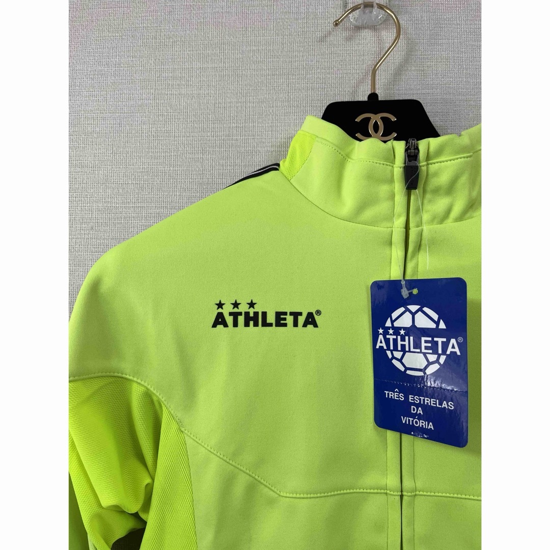 ATHLETA(アスレタ)のアスレタ　ライトウルトラシェルジャケット＆ピステパンツ 上下　150 黄×黒 スポーツ/アウトドアのサッカー/フットサル(ウェア)の商品写真