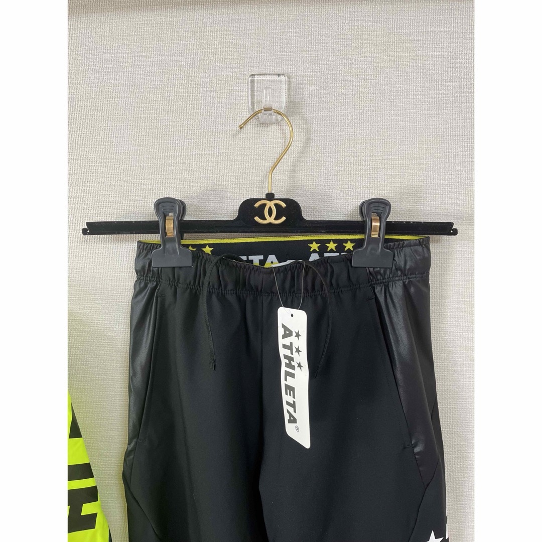 ATHLETA(アスレタ)のアスレタ　ウインドピステシャツ&ストレッチパンツ 上下セット　130 黄×黒 スポーツ/アウトドアのサッカー/フットサル(ウェア)の商品写真