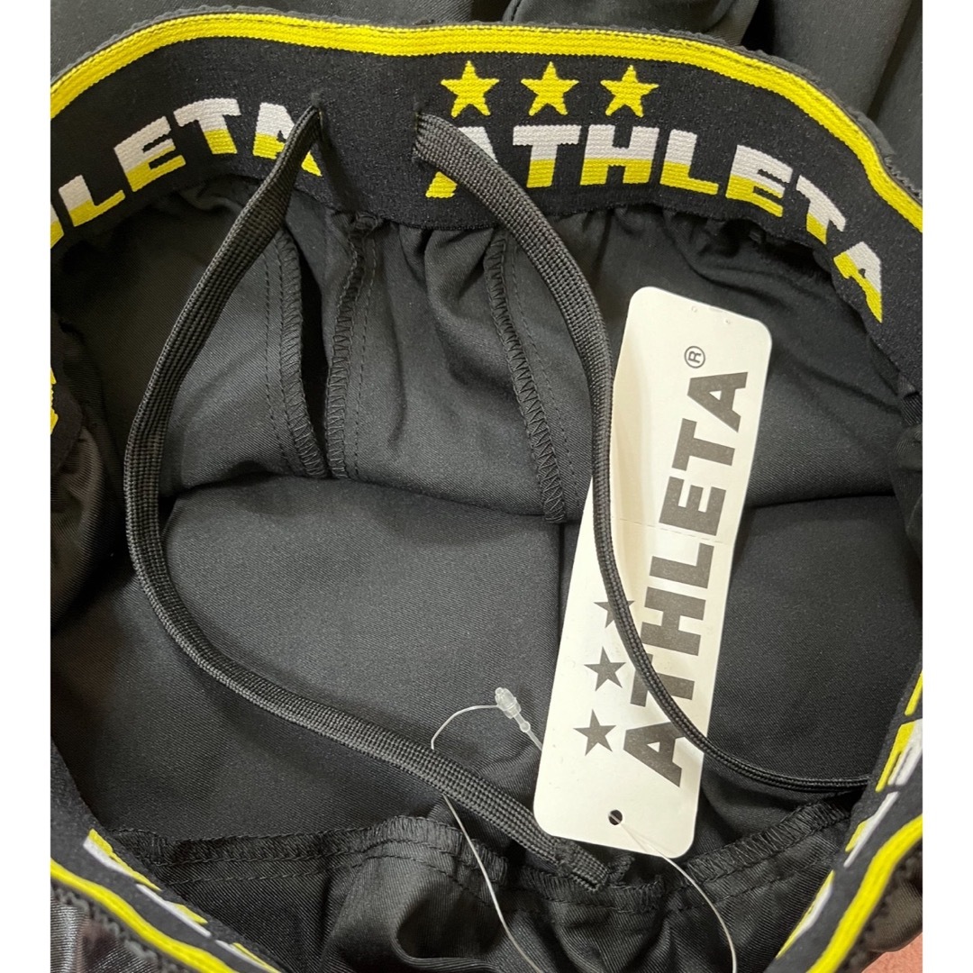 ATHLETA(アスレタ)のアスレタ　ウインドピステシャツ&ストレッチパンツ 上下セット　130 黄×黒 スポーツ/アウトドアのサッカー/フットサル(ウェア)の商品写真