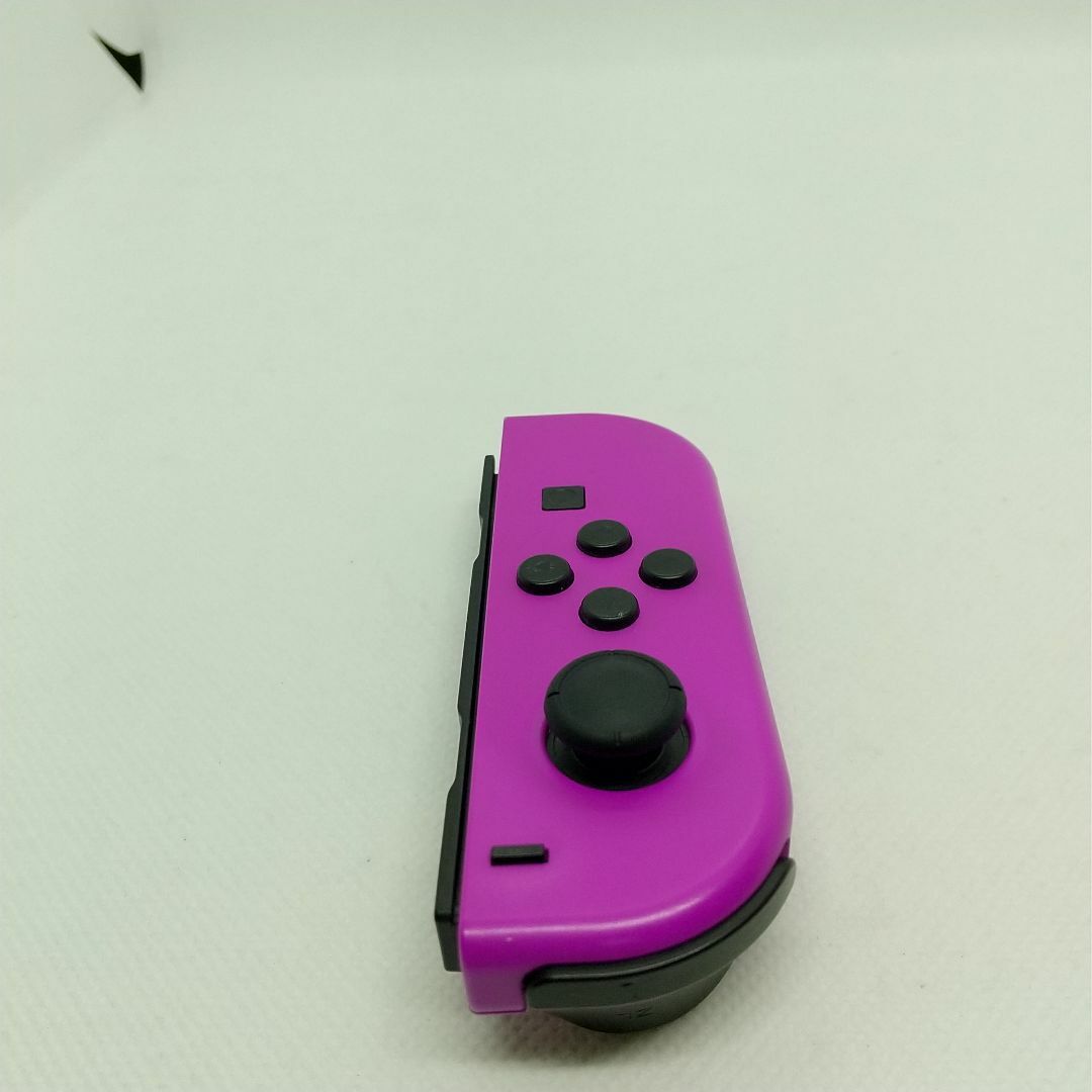 Nintendo Switch(ニンテンドースイッチ)の【希少】①Switch ジョイコン　ネオンパープル　左のみ(L)【任天堂純正品】 エンタメ/ホビーのゲームソフト/ゲーム機本体(家庭用ゲーム機本体)の商品写真