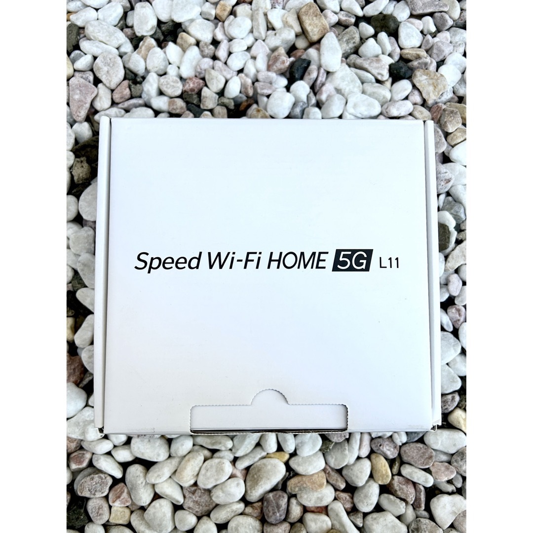 ZTE(ゼットティーイー)のSpeed Wi-Fi HOME 5G L11 ホワイトwifiルーター スマホ/家電/カメラのPC/タブレット(PC周辺機器)の商品写真