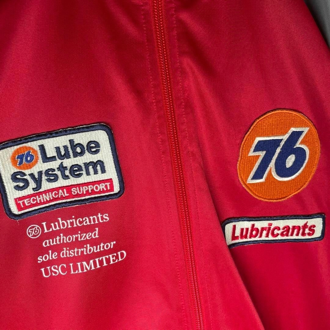 76 Lubricants(セブンティーシックスルブリカンツ)の[古着]Lubricants　トラックジャケット　バック刺繍　ナンバー　赤　灰色 メンズのトップス(ジャージ)の商品写真