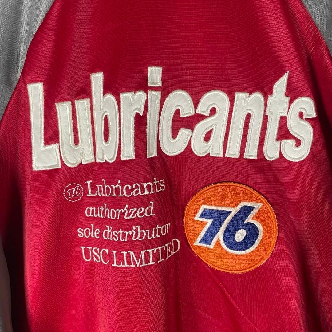 76 Lubricants(セブンティーシックスルブリカンツ)の[古着]Lubricants　トラックジャケット　バック刺繍　ナンバー　赤　灰色 メンズのトップス(ジャージ)の商品写真