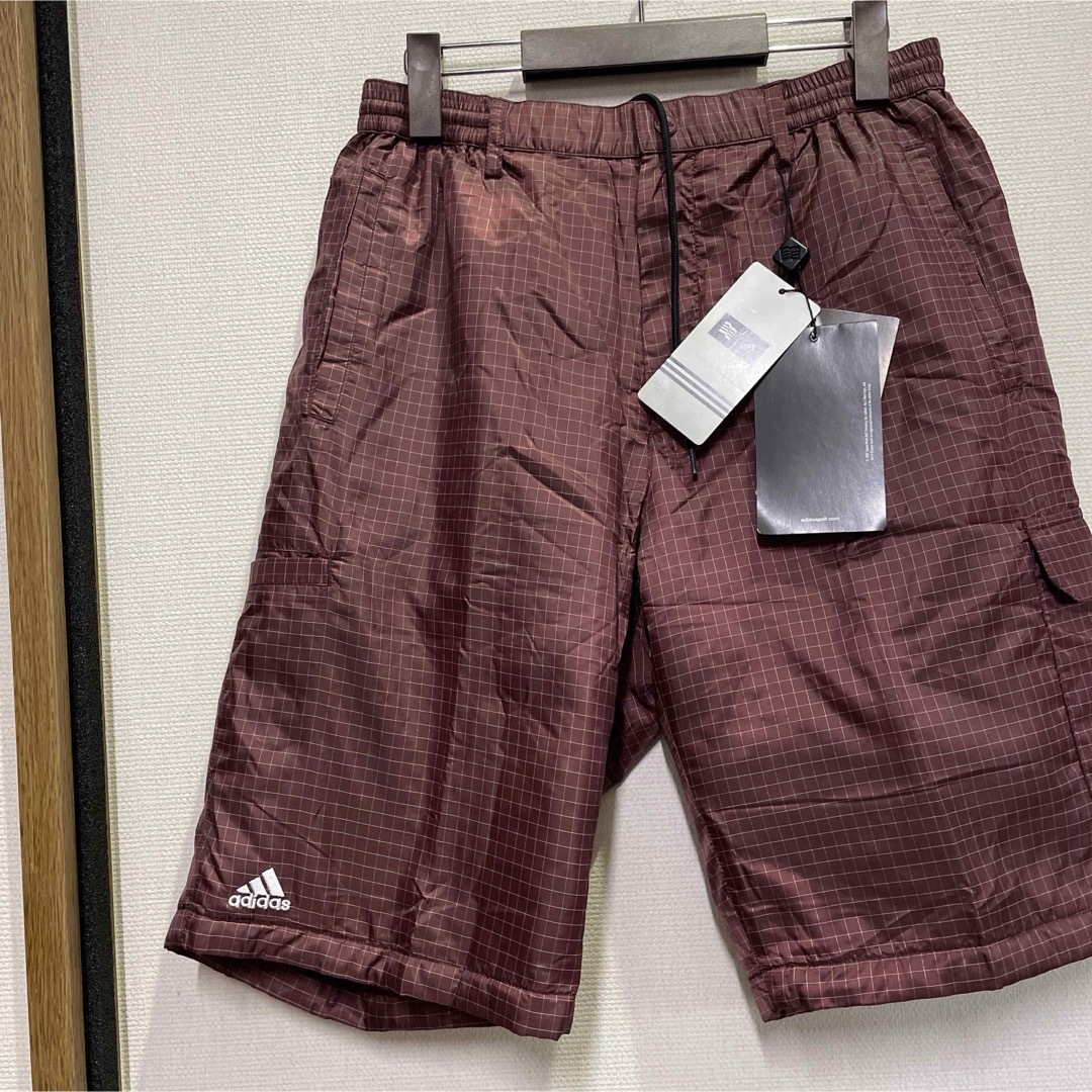 adidas(アディダス)のアディダス　メンズエアパック防寒中綿ハーフパンツ　M スポーツ/アウトドアのテニス(ウェア)の商品写真