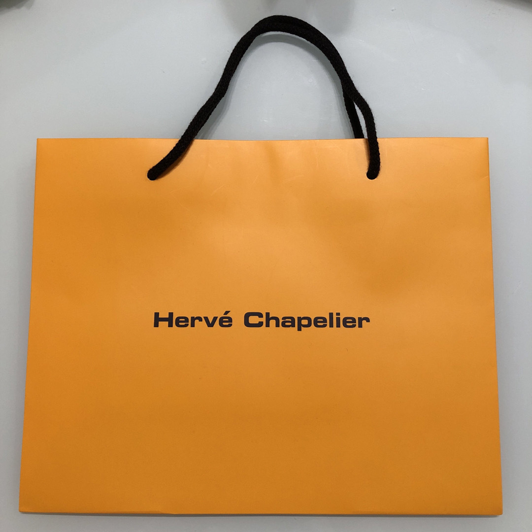 Herve Chapelier(エルベシャプリエ)の【未使用】エルベシャプリエ  ショッパー　紙袋　オレンジ　セット レディースのバッグ(ショップ袋)の商品写真