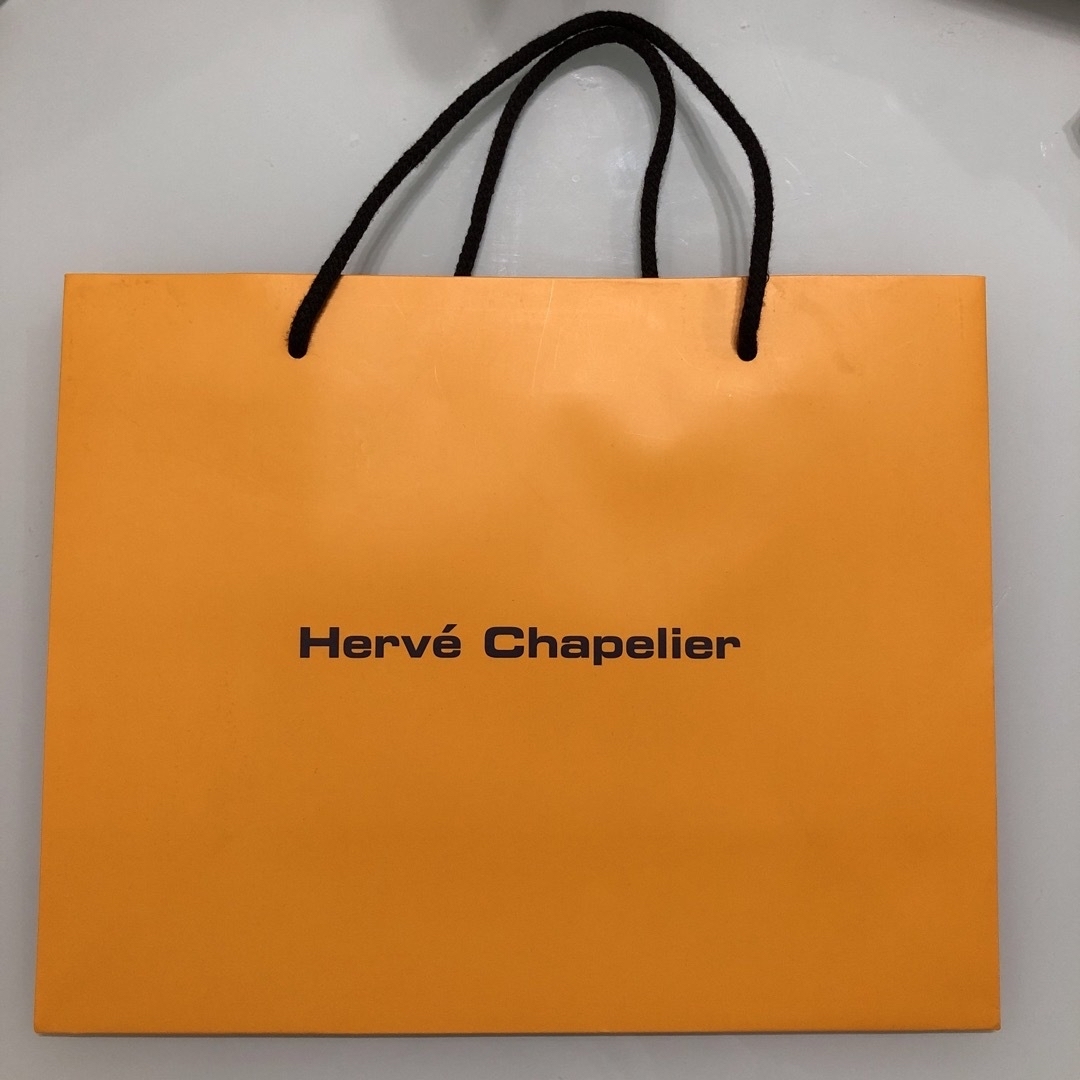 Herve Chapelier(エルベシャプリエ)の【未使用】エルベシャプリエ  ショッパー　紙袋　オレンジ　セット レディースのバッグ(ショップ袋)の商品写真