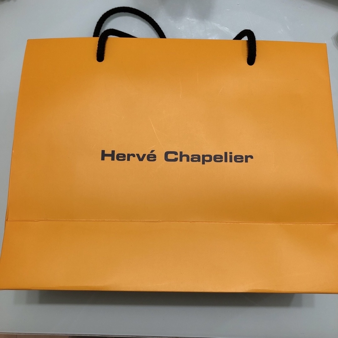 Herve Chapelier(エルベシャプリエ)の【未使用】エルベシャプリエ  ショッパー　紙袋　オレンジ　セット レディースのバッグ(ショップ袋)の商品写真