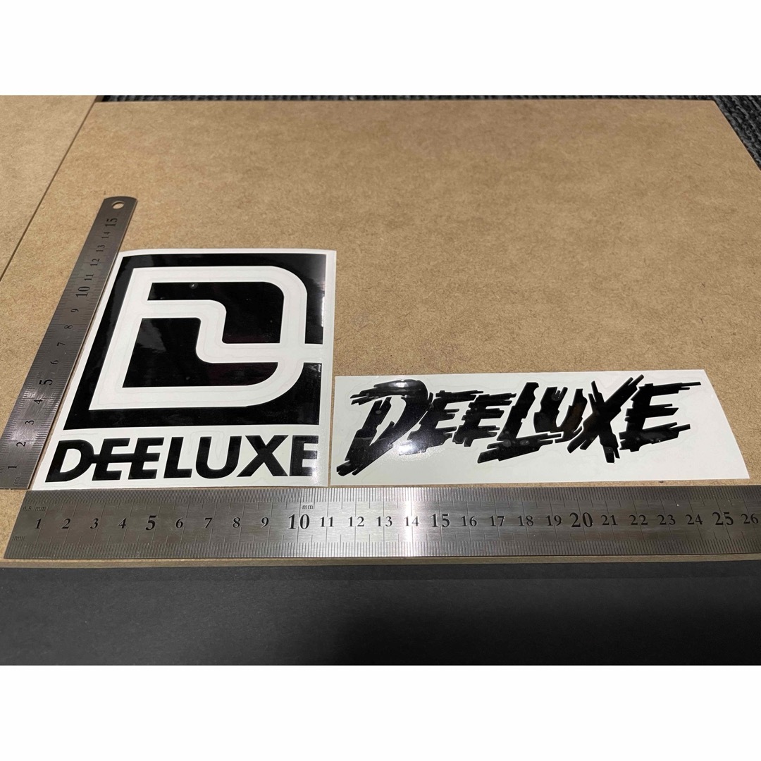 ディーラックス　DEELUXE カッティング　ステッカー　黒2枚 自動車/バイクのバイク(ステッカー)の商品写真